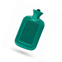 A teal green hot water bottle with a textured surface and a small cap, shown floating on a white background with a soft shadow underneath.