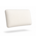 A white textured pillow with a raised honeycomb pattern, shown floating against a solid white background with a soft shadow underneath.