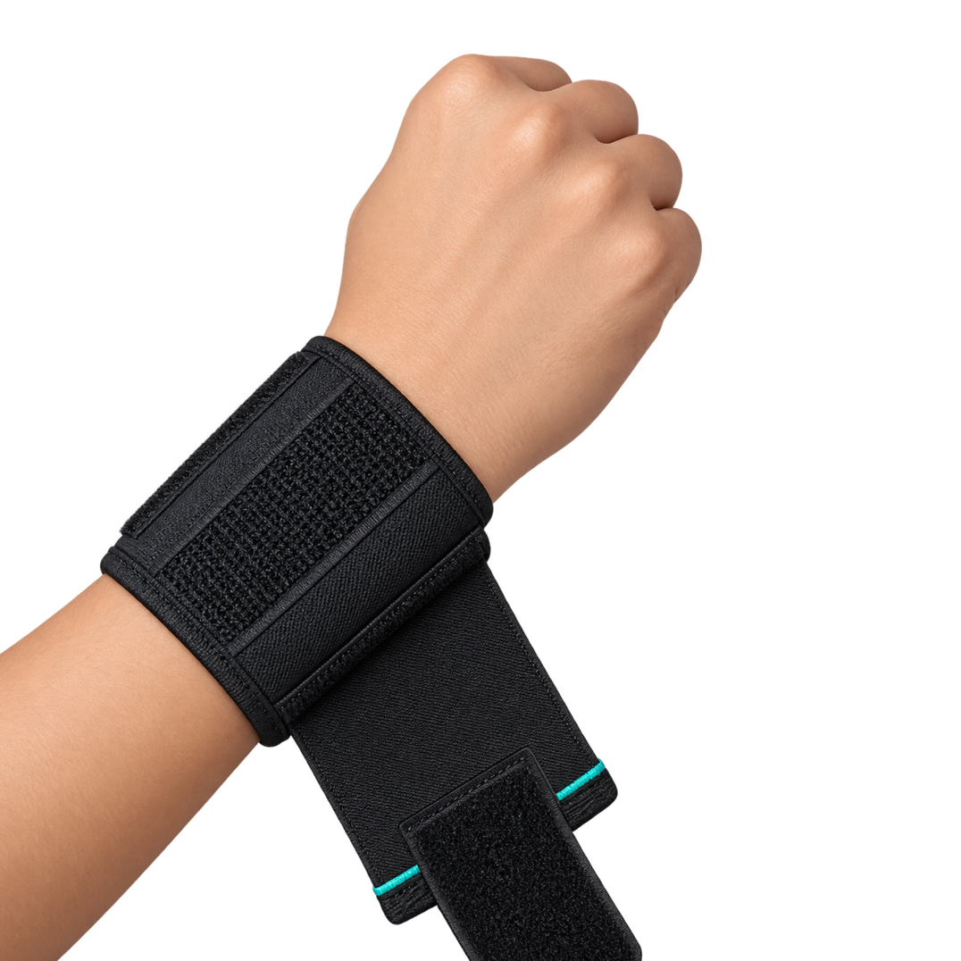 A black wrist support brace worn on a person's wrist, shown against a plain white background.